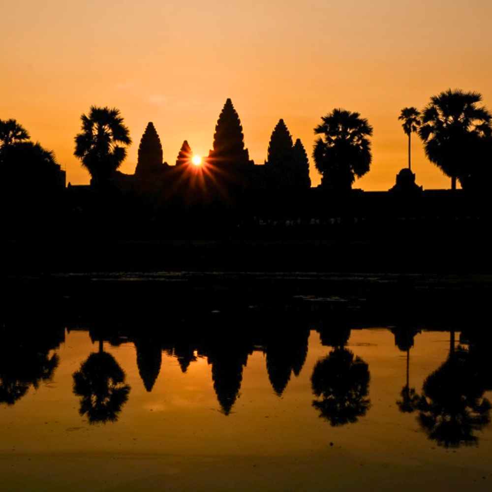 Angkor Wat Sunrise – Experience the magical sunrise at Angkor Wat from a quiet, eastern entrance, setting a serene start to the day.